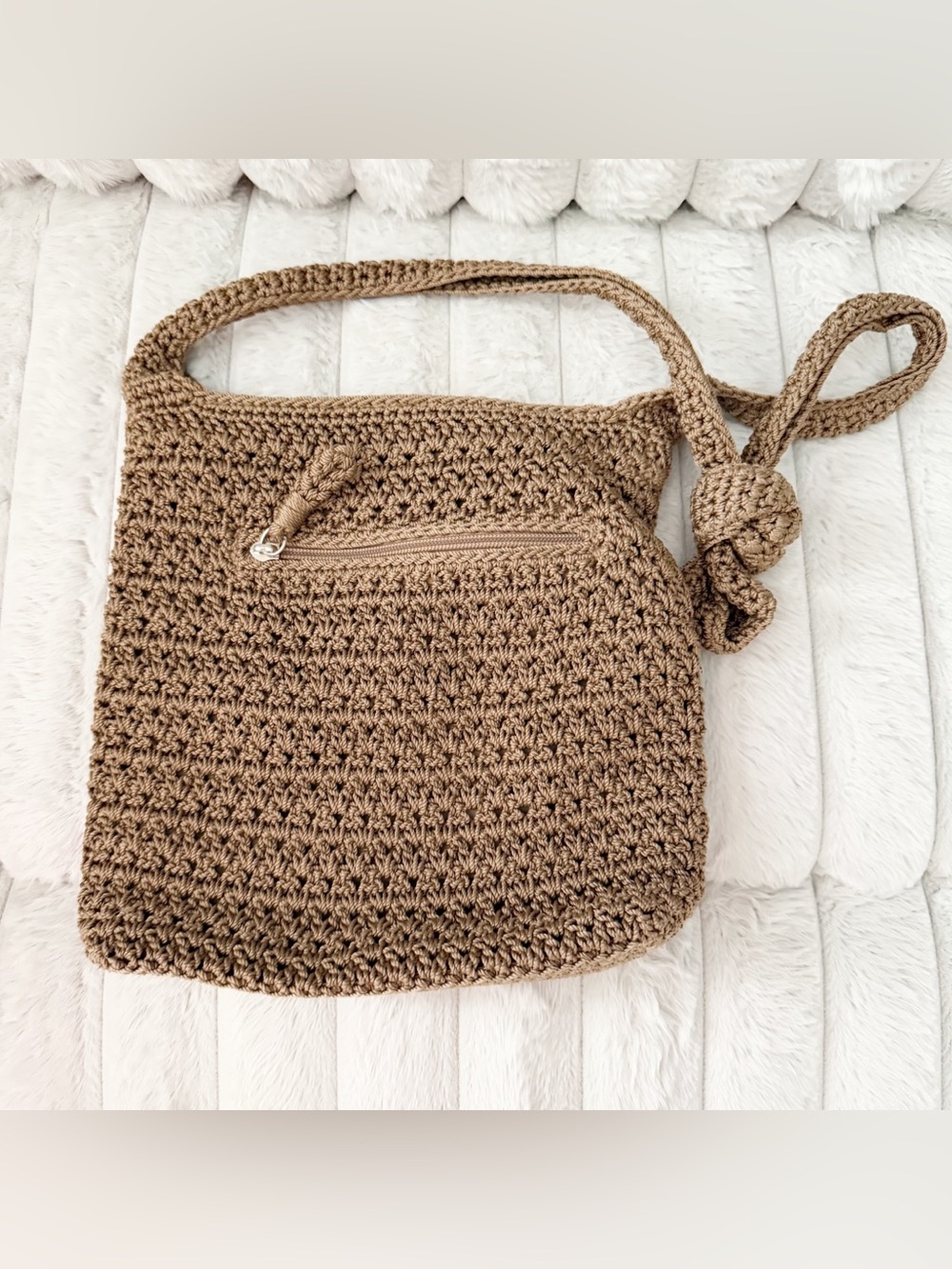 The Sak crochet woven y2k crossbody bag.
